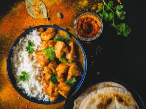 A bowl of Belicious Butter Chicken with a serve of white rice